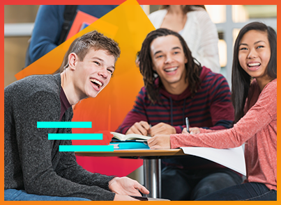 three laughing students at a desk after a creative way to increase student motivation and achievement