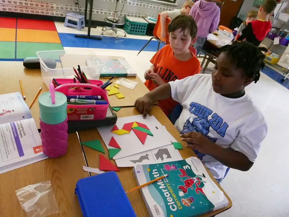 Elementary students from Springfield District 186 play together while learning math