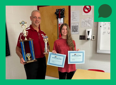 Lydia Jordan showing her MATHia certificates next to her teacher, who is holding two trophies. 