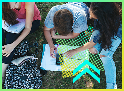 Learning acceleration, not remediation, for back to school | students doing math on grass